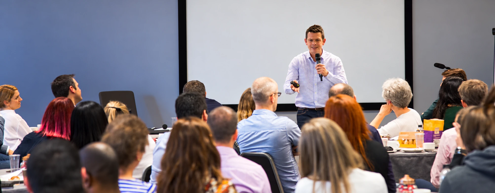 Gavin working with customer service professionals